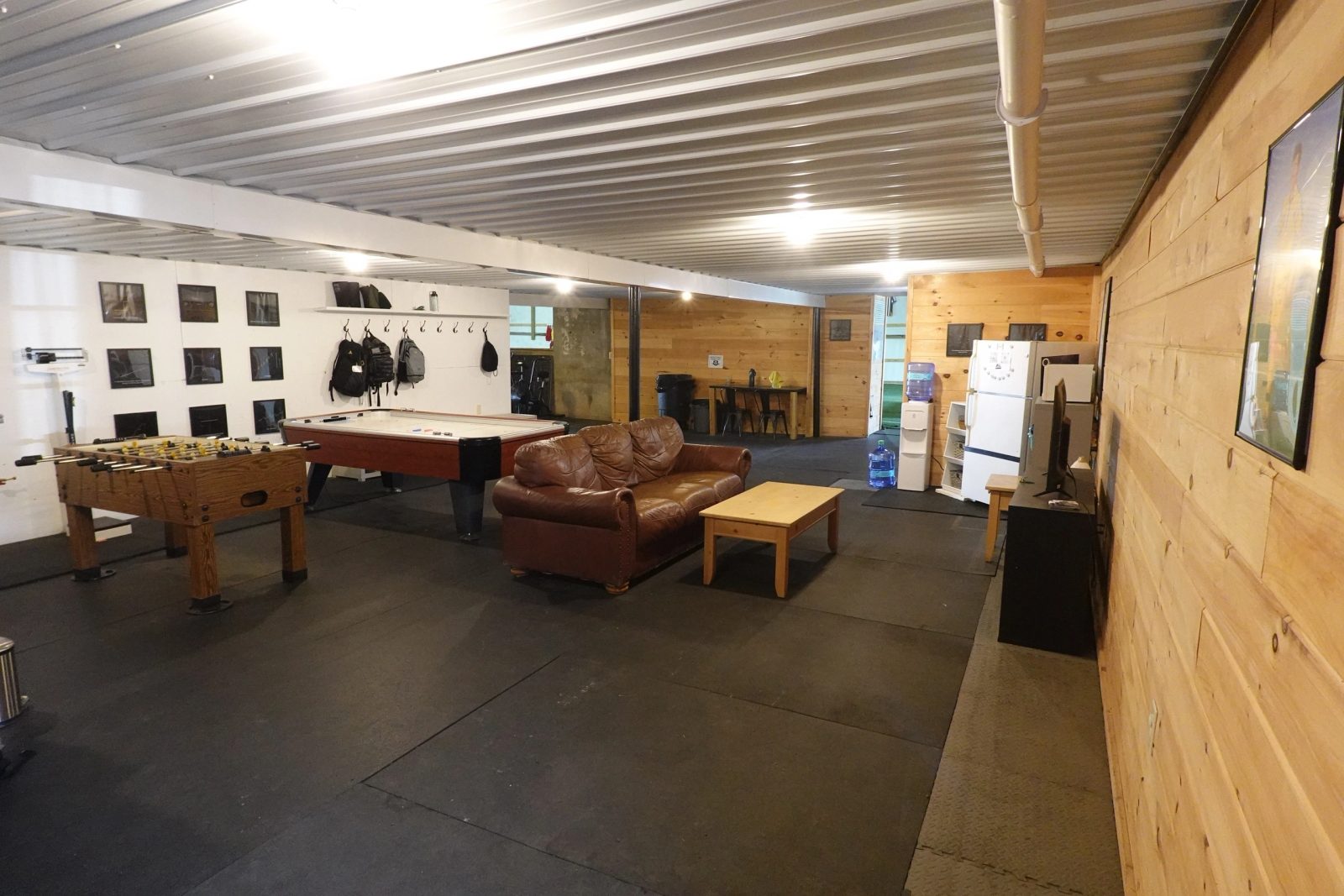 Athlete lounge with foosball and recovery space